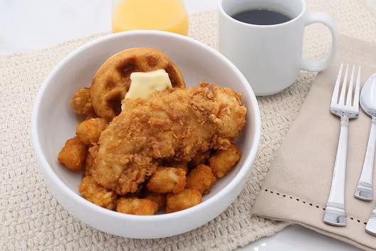 Chicken & Waffle Bowl (600 calories), featuring crispy chicken served over waffle pieces with sweet and savory flavors.