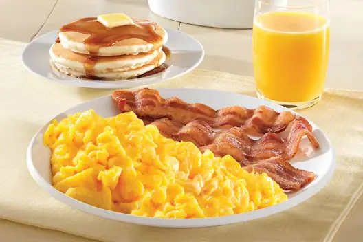 Two-Egg Breakfast (559–825 calories), featuring two eggs served with classic breakfast sides.