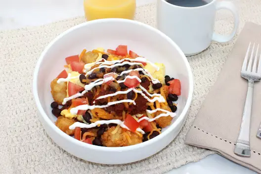 Southwest Breakfast Bowl (500–650 calories), featuring a hearty mix of breakfast ingredients with Southwest-inspired flavors served in a bowl.